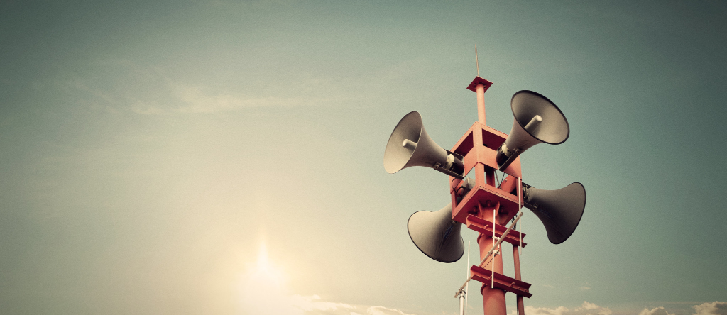 A tower with four speakers