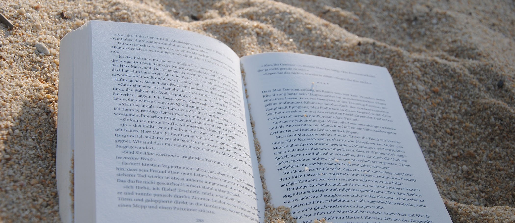 One book on beach sand