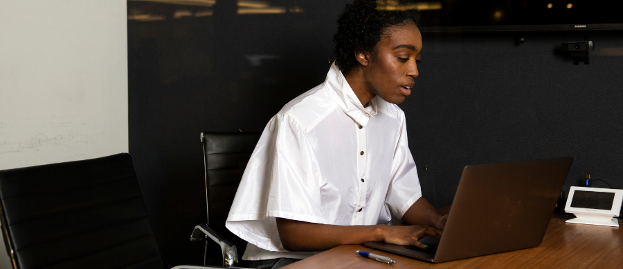 Person typing on computer