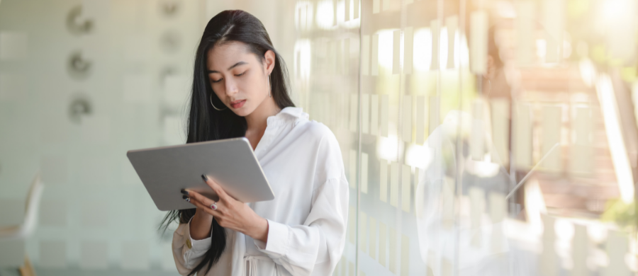 Student consulting a tablet