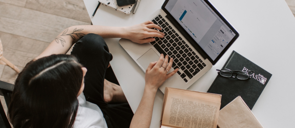 A girl looking at resources for her academic work