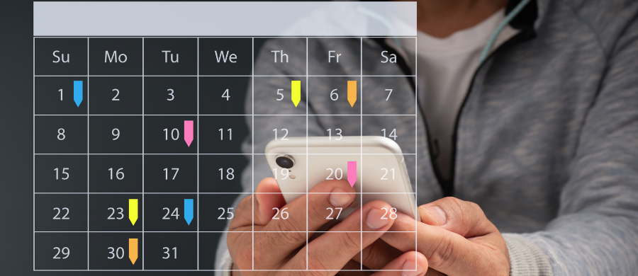 A person consulting a digital calendar